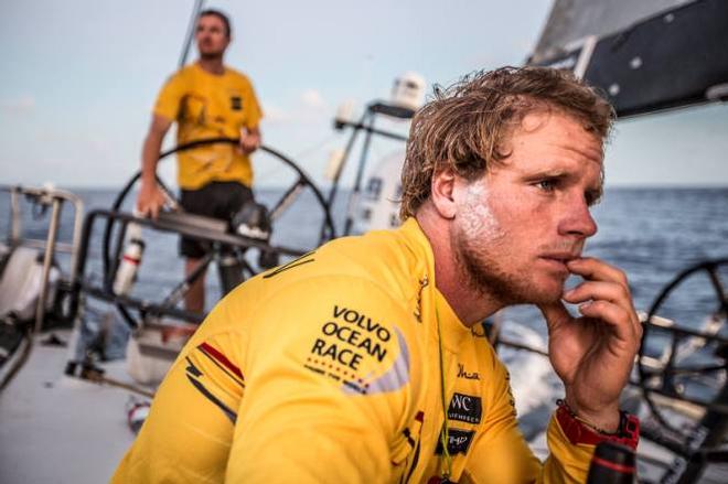 Onboard Abu Dhabi Ocean Racing – Luke Parko Parkinson pensively looks at the sail trim at sunset in the Atlantic Ocean - Leg six to Newport – Volvo Ocean Race 2015 © Matt Knighton/Abu Dhabi Ocean Racing